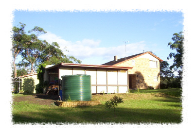 The new tank and the carport enclosure